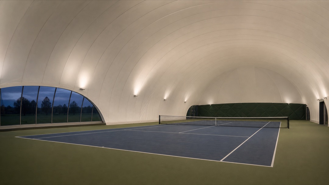 Concept visualisation — an empty tennis court inside a proposed Air Dome